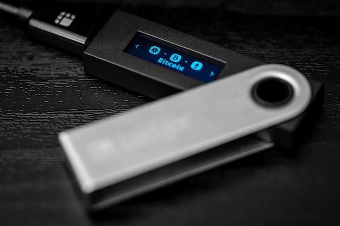 Hardware crypto wallet: the Ledger Nano S connected to a computer.