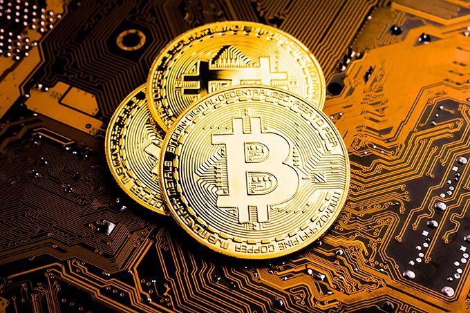 Blockchain explained: Bitcoins on a computer chip.