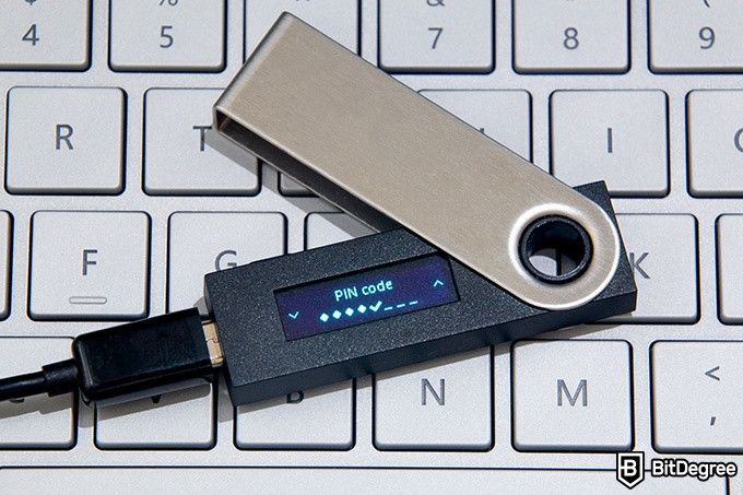Best Dogecoin wallet: a hardware cryptocurrency device on a keyboard (Ledger Nano S).