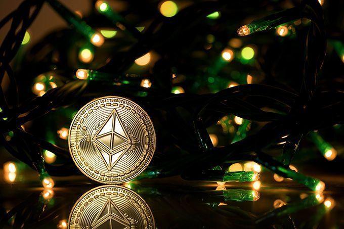 Ethereum Classic: the ETC coin placed among some Christmas lights.