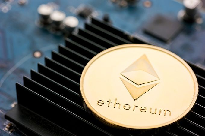 How to buy Ethereum: an ETH coin on a mining rig.