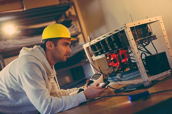 How to mine Ethereum on Windows: a crypto engineer fixing a mining rig.