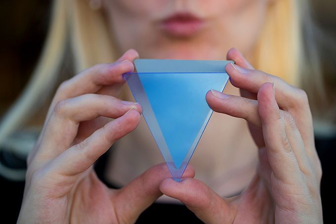 Verge coin: a woman holding the Verge logo.