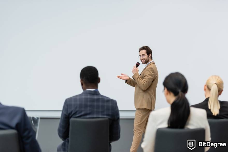 Best-paying jobs in finance: a man giving a presentation.