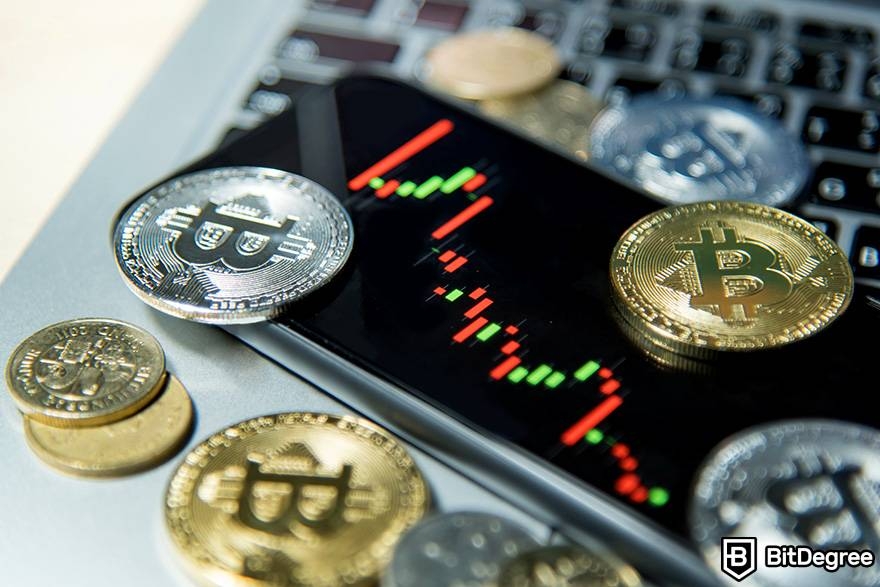 KYC Olmadan Kripto Nasıl Alınır: Fiziksel Bitcoin'lerle Çevrelenmiş Bir Telefon