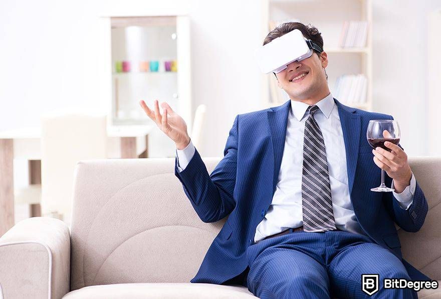How to use metaverse: man drinking wine with VR goggles.