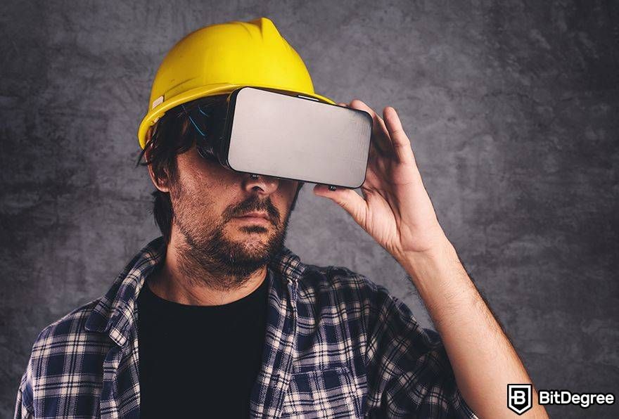 Interoperability in the metaverse: man in hard-hat with VR goggles.
