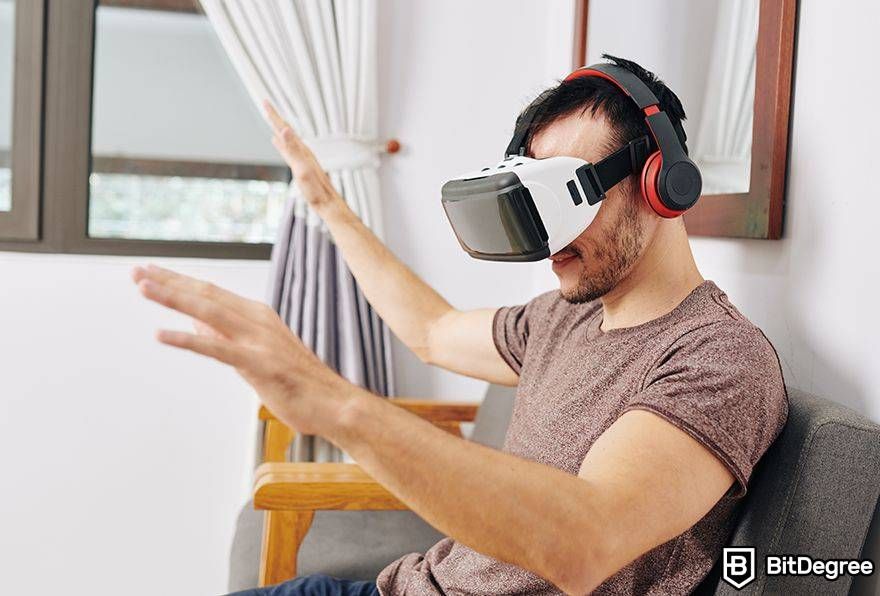 Metaverse augmented reality: man in VR with arms out.