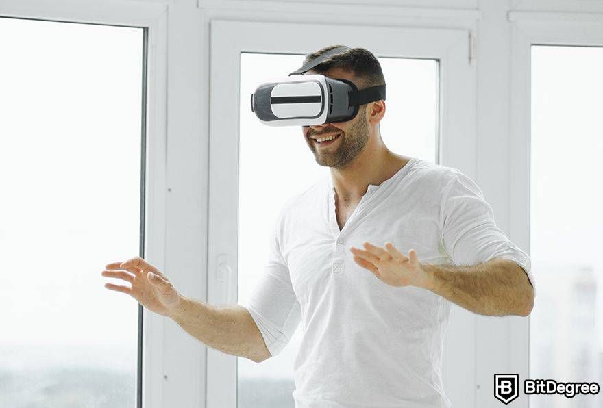 Metaverse augmented reality: man smiling in VR/AR headset.