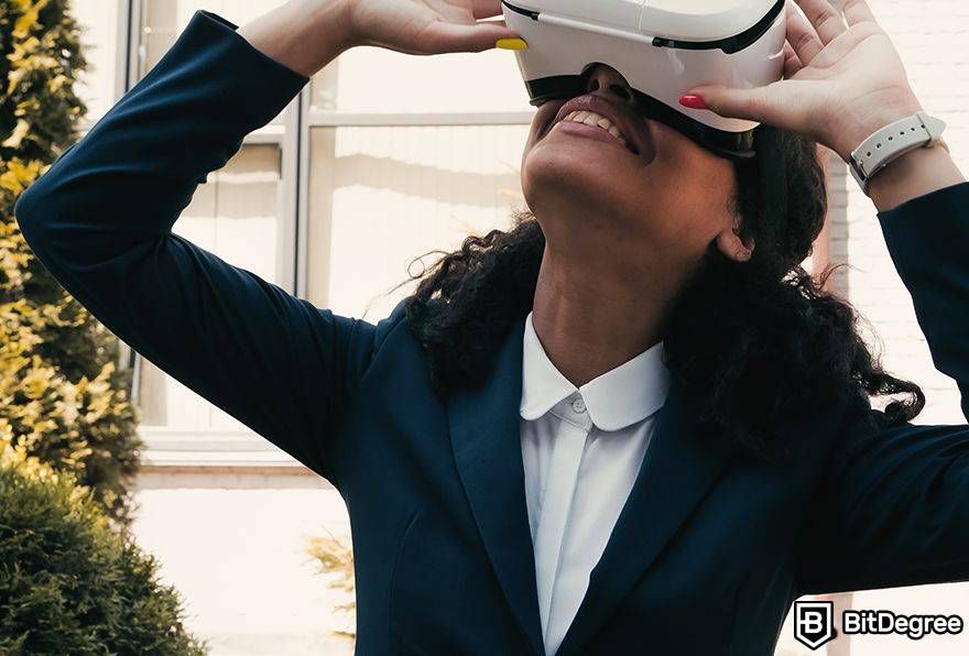 Metaverse business opportunities: woman in suit uses VR.