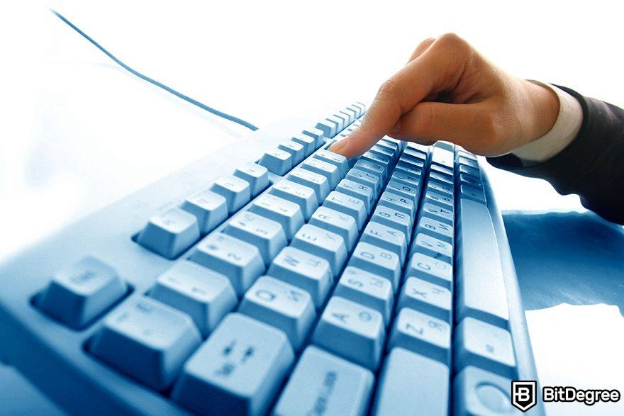 Polygon domain: person pressing key on a keyboard.