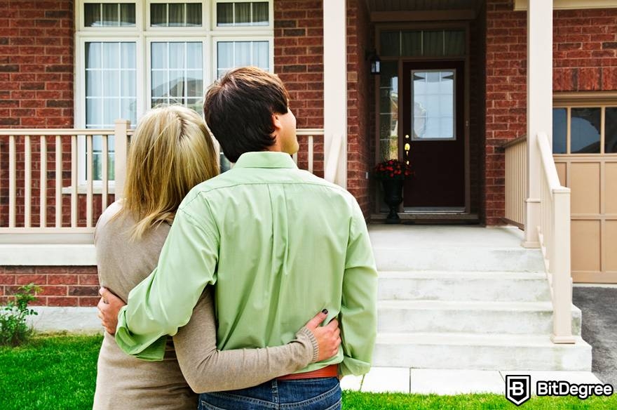 What is a smart contract: A couple next to a house.