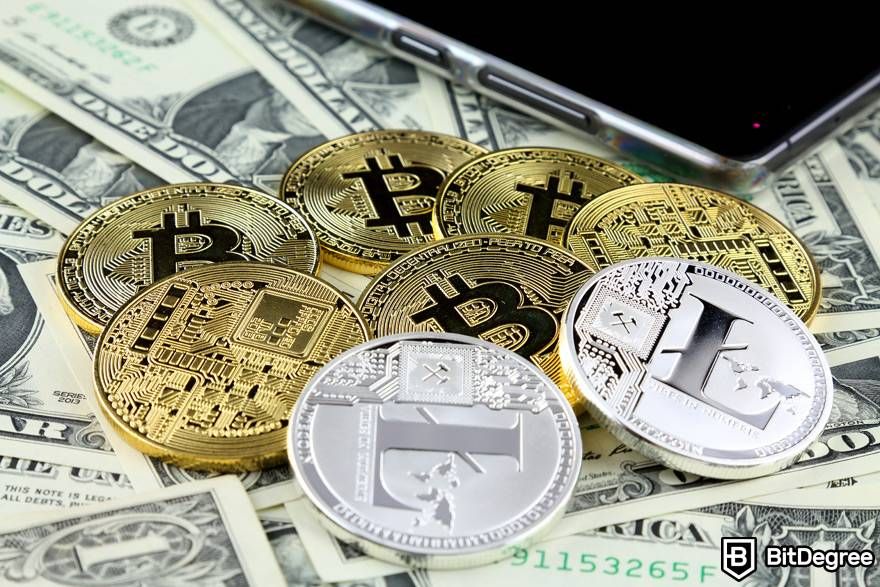 What is leverage trading crypto: a pile of physical Bitcoin and Litecoin coins.