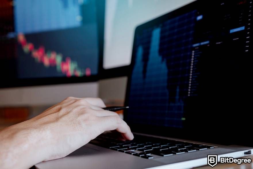 What is leverage trading crypto: hands are typing on a laptop keyboard.