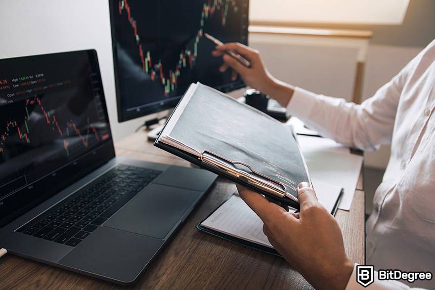 What is margin trading crypto: an investor is comparing several market charts.