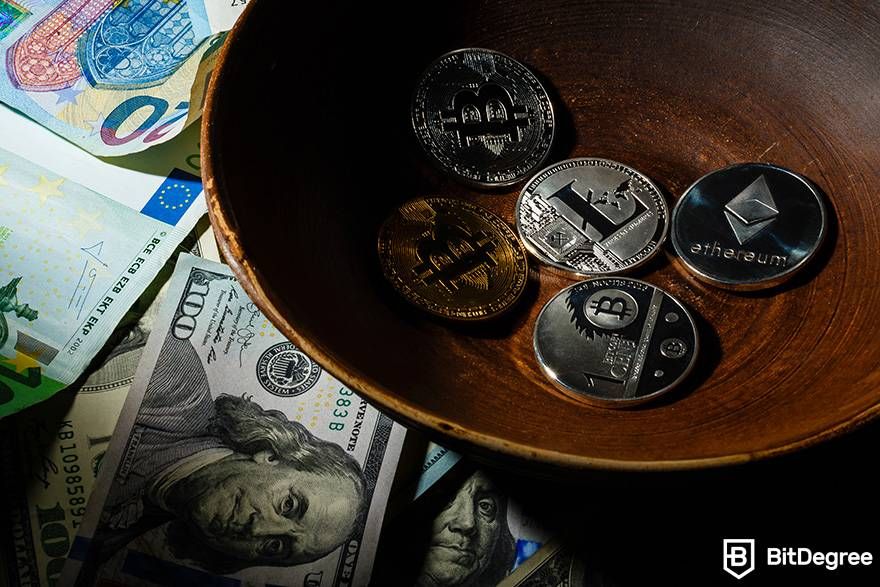 What is spot trading in crypto: a bowl with five cryptocurrency coins is places next to different fiat currency bills.
