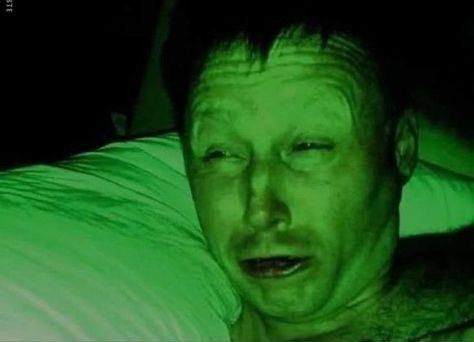 Guy shining green