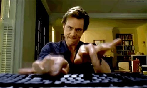 Meme of Jim Carrey typing intensely