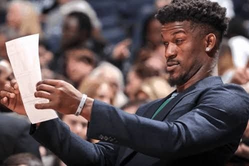 Picture of a guy squinting at a piece of paper