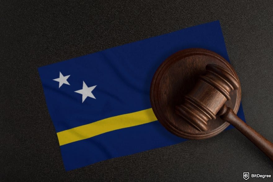 7Bit Casino review: a gavel on top of the Curacao flag. 7Bit Casino review: a gavel on top of the Curacao flag.