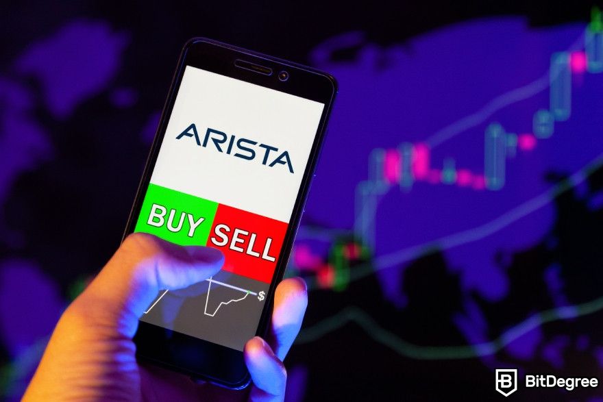 AI companies to invest in: Arista stocks with buy or sell displayed on a phone.