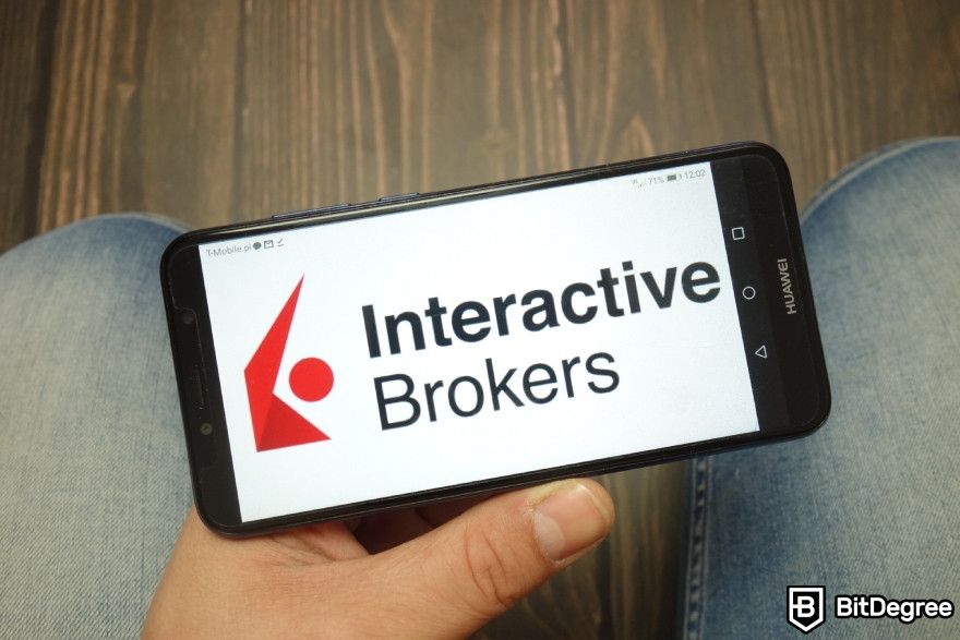 AI companies to invest in: Interactive Brokers logo displayed on a phone.