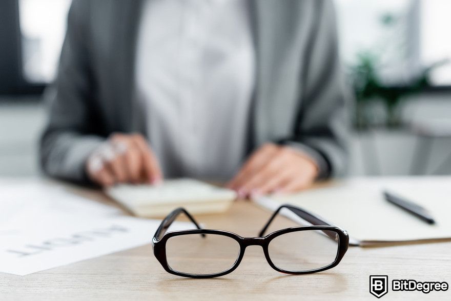 AI jobs: glasses on the desk.