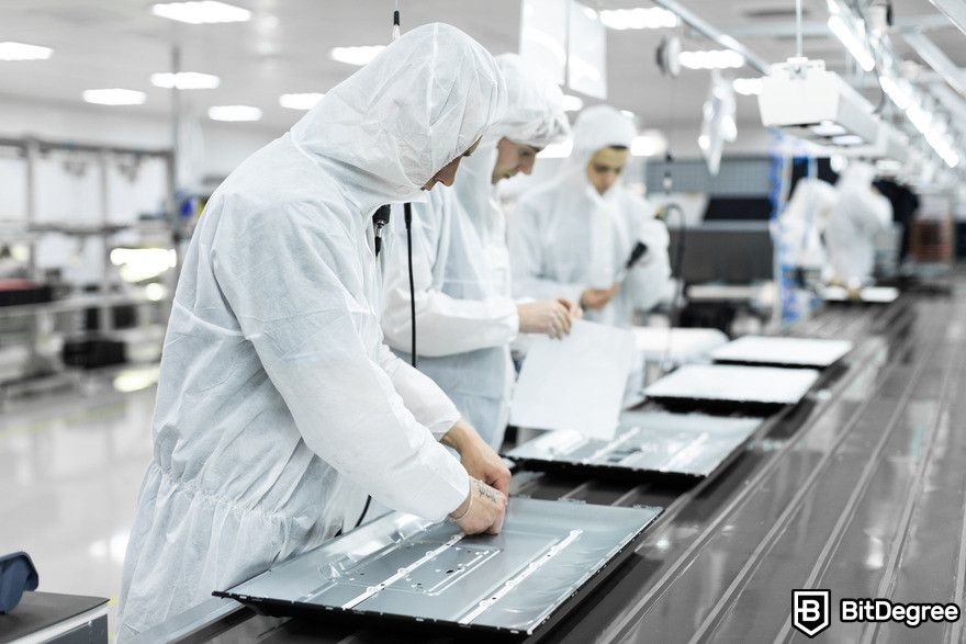 AI jobs: line workers assembling TVs.