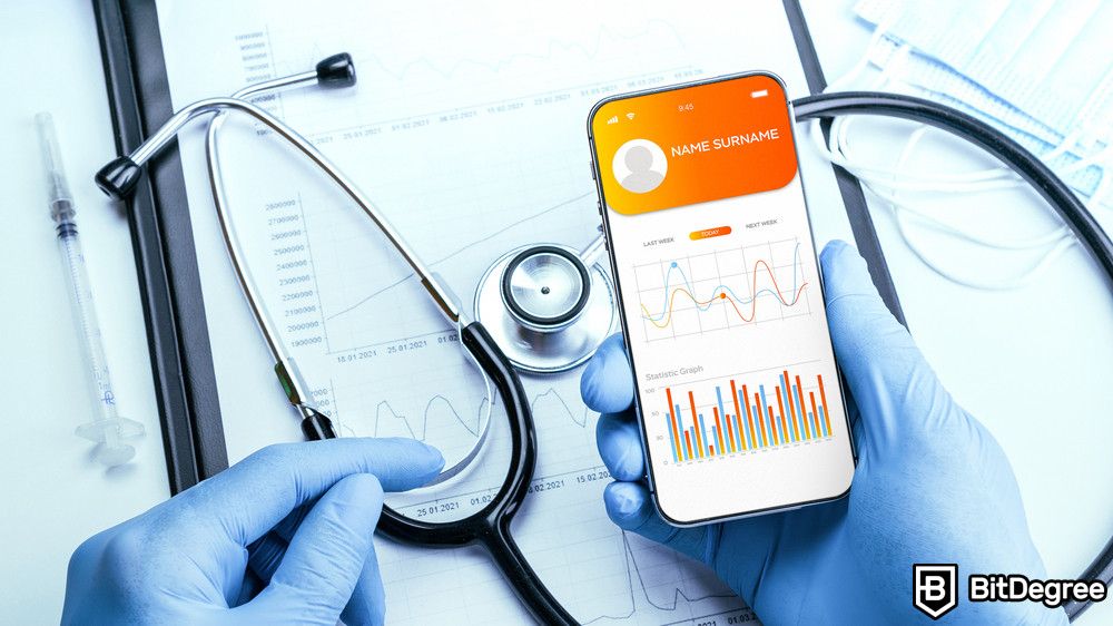 Application of blockchain: a medical personel holding a smartphone with an app running.