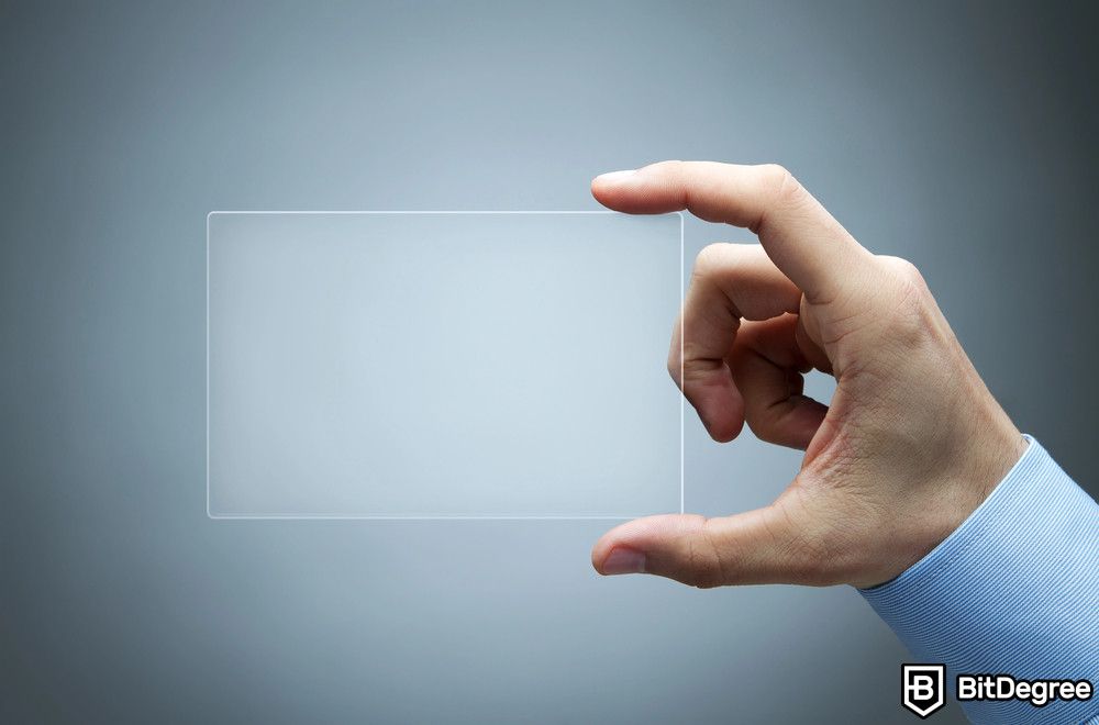 Application of blockchain: a man's hand holding a transparent rectangle object.