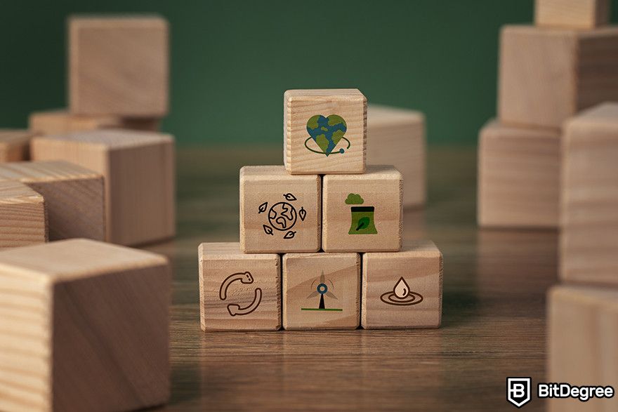 Are NFTs dead: stacks of wooden block with logos representing the environment.