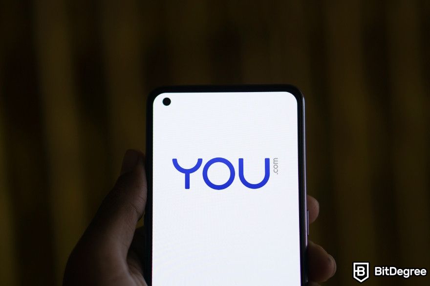 Best AI chatbot: A phone with YouChat logo displayed.