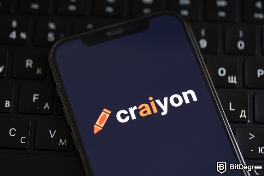 Best AI image generator: Craiyon logo displayed on a phone.