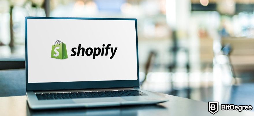 Best AI logo generator: A laptop with Shopify logo.