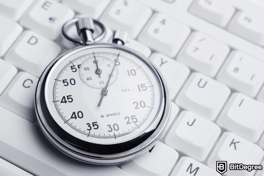 Best AI tools: A stopwatch placed on a keyboard.