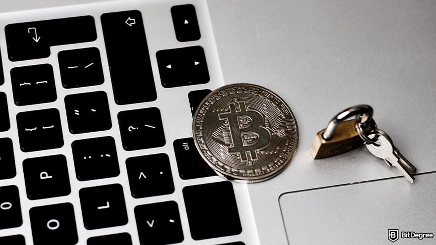 Best Bitcoin wallet: a BTC coin and a padlock on a laptop keyboard.