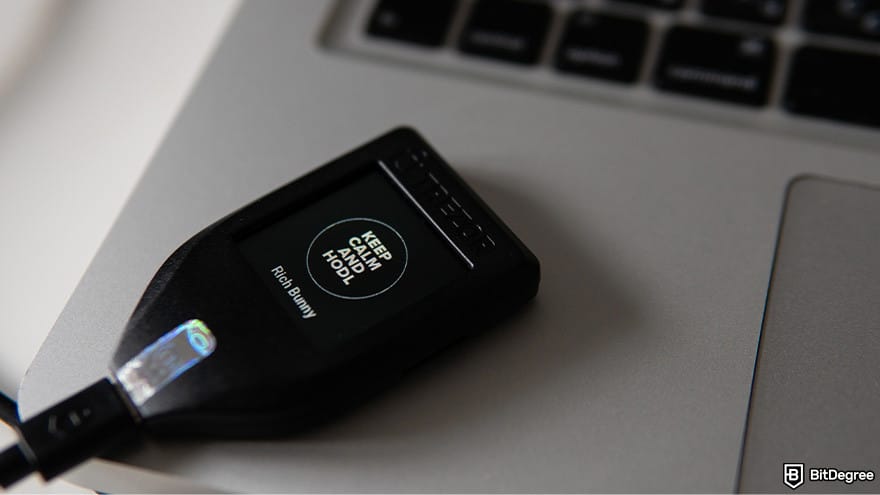 Best Bitcoin wallet: a Trezor hardware wallet on a laptop.