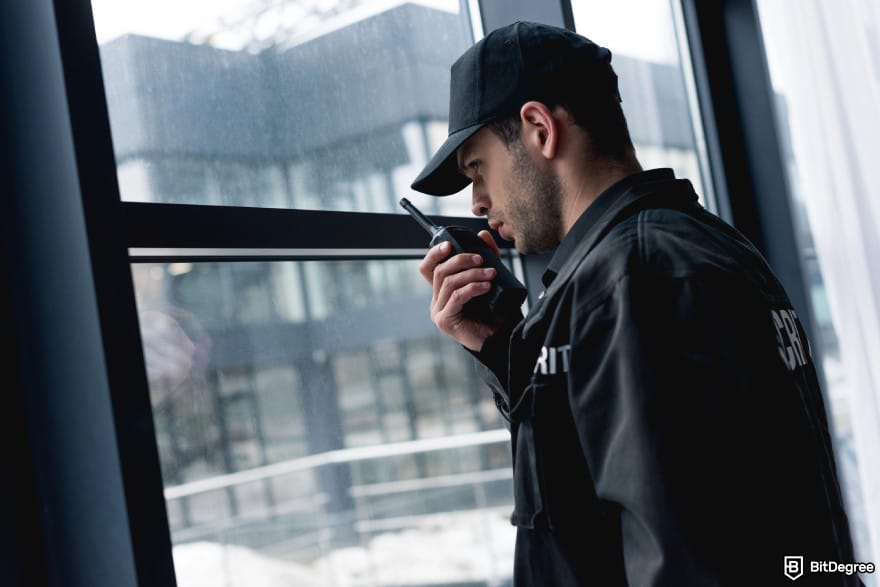 Best BNB wallet: a security guard watching through the window.