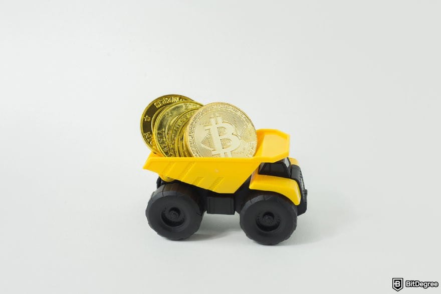 Best cloud mining platforms: toy truck carrying BTC coins.