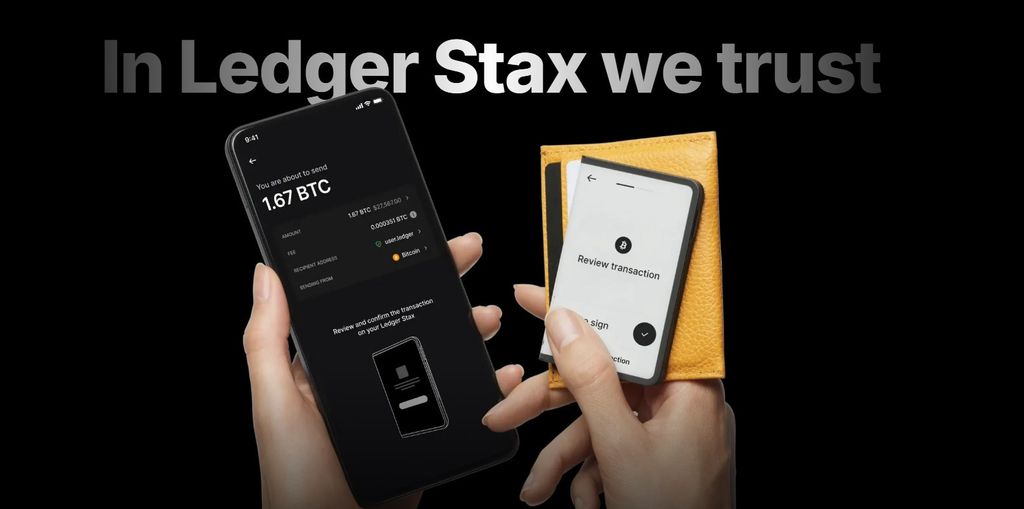 Best Cosmos wallet: a phone user confirms a Bitcoin transaction on their Ledger Stax hardware wallet.