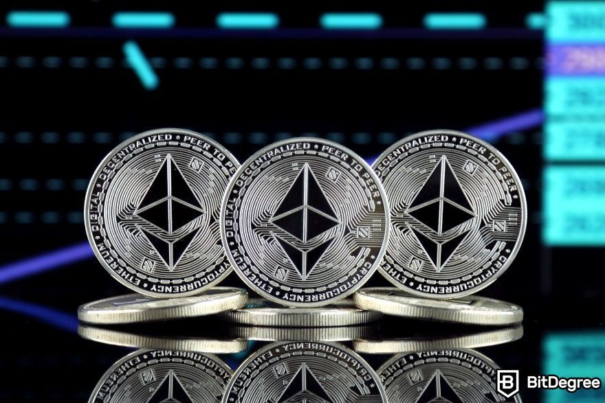 Best crypto airdrops: three physical ETH coins stacked on a table, representing the Ethereum ICO.
