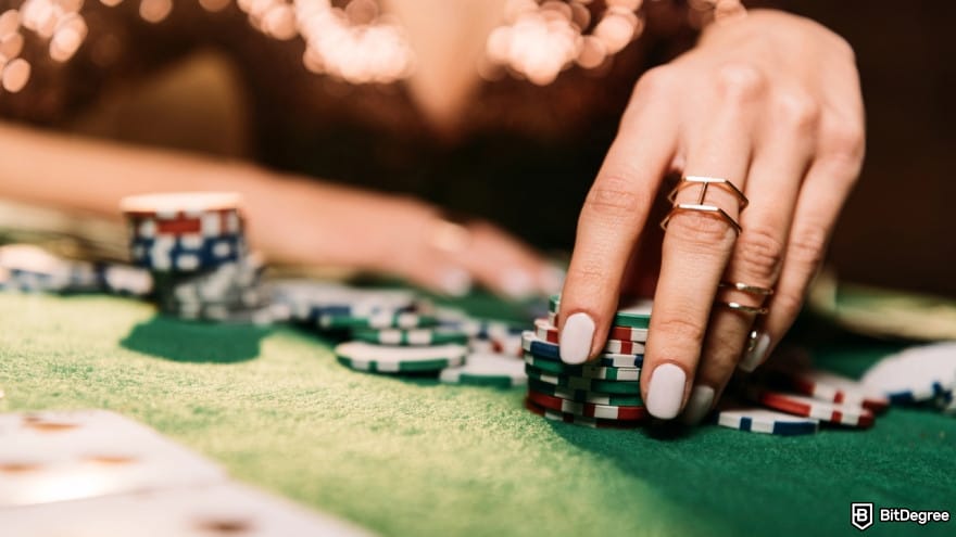 Best crypto casino bonus: a person taking chips at table. Best crypto casino bonus: a person taking chips at table.