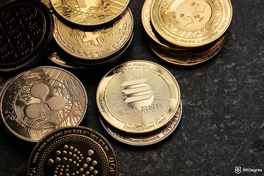 Best crypto exchange Hong Kong: various crypto coins on a dark surface.
