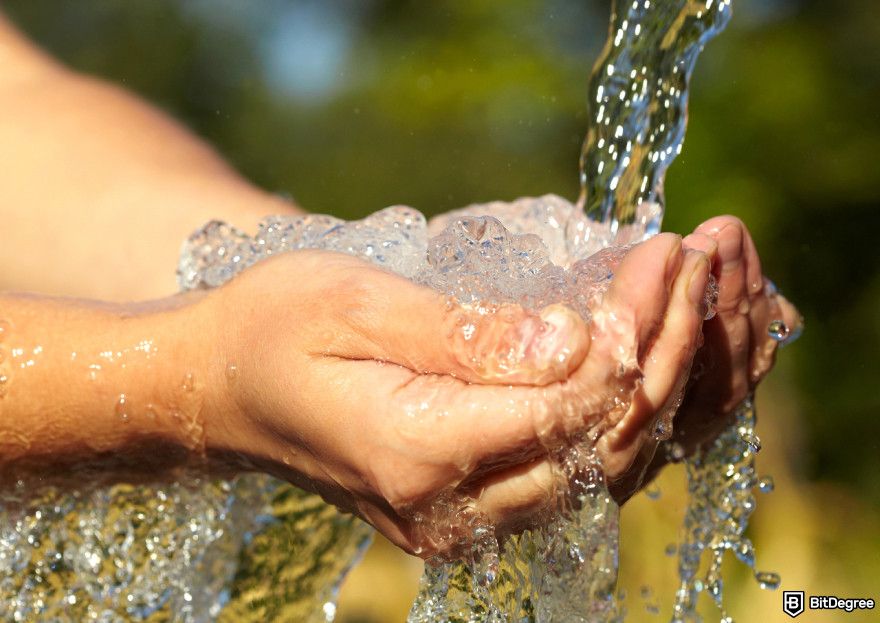 Best crypto futures trading platform: a person holding a stream of water representing liquidity.