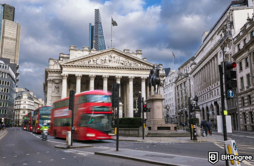 Best crypto wallet UK: a bank and a passing red bus.