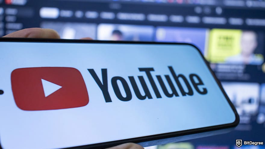 Best crypto youtube channels: smartphone displaying Youtube logo.