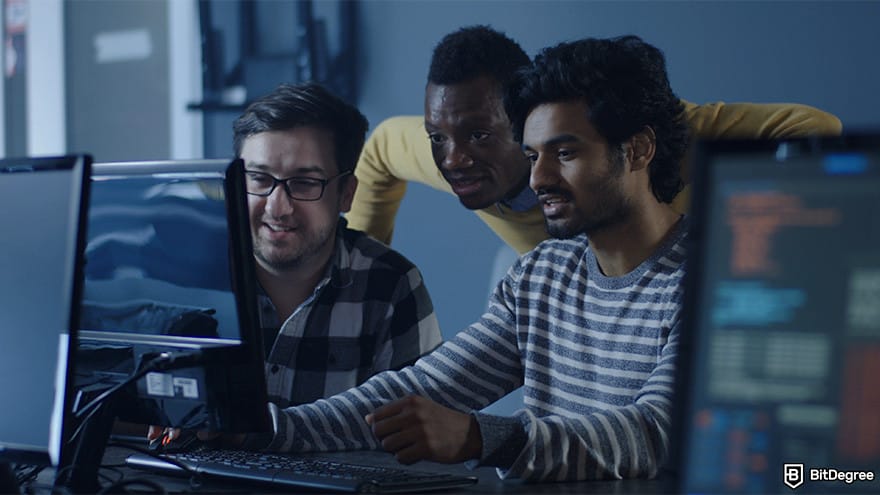 Best cryptocurrency of the year: founder and developers working on a project.