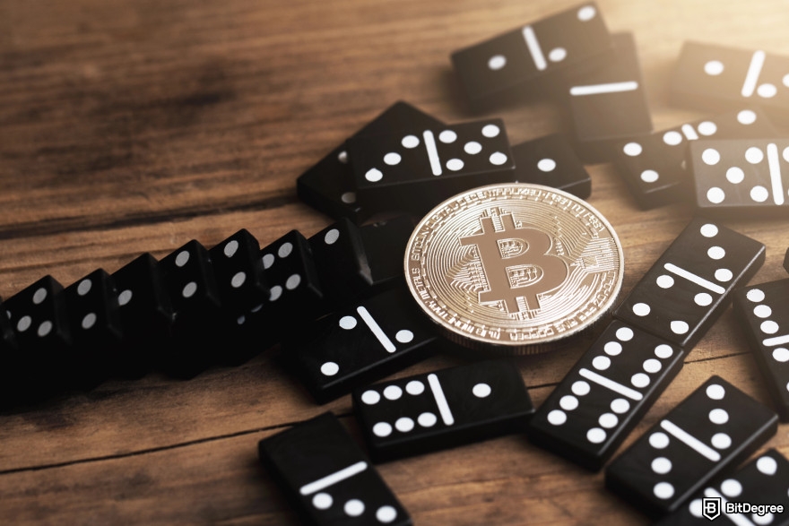 Best free crypto airdrops: dominoes with a Bitcoin.