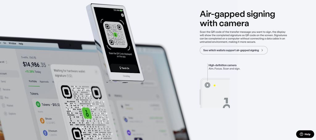 Best Kaspa wallet: the OneKey Pro's camera scanning a QR code on a laptop.