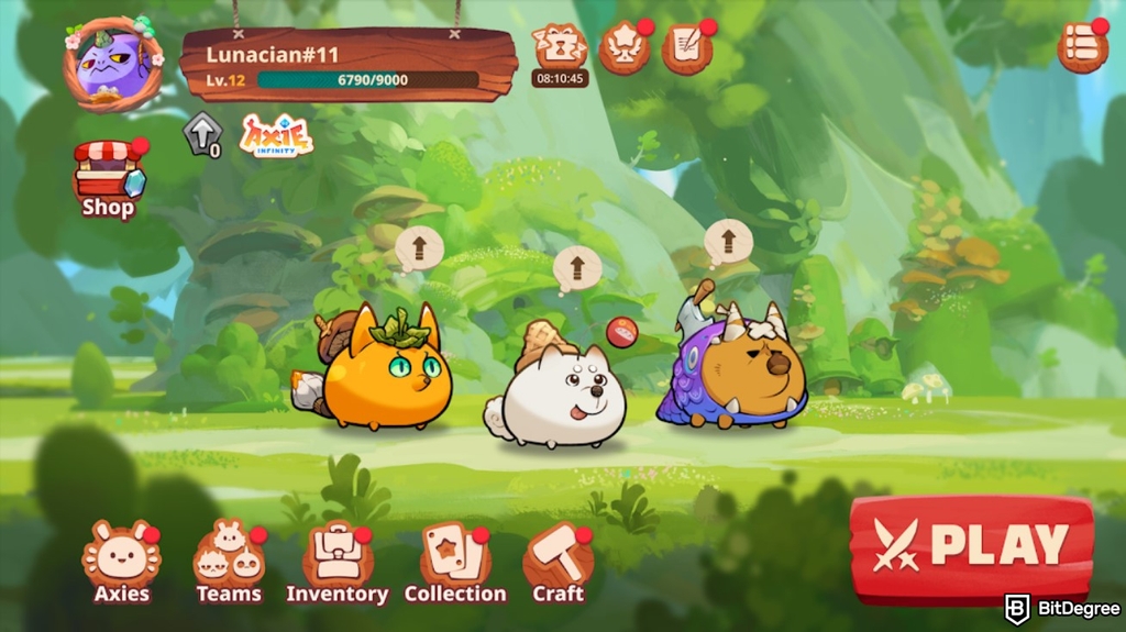 Best money making apps: the Axie Infinity game interface showing three Axie characters.